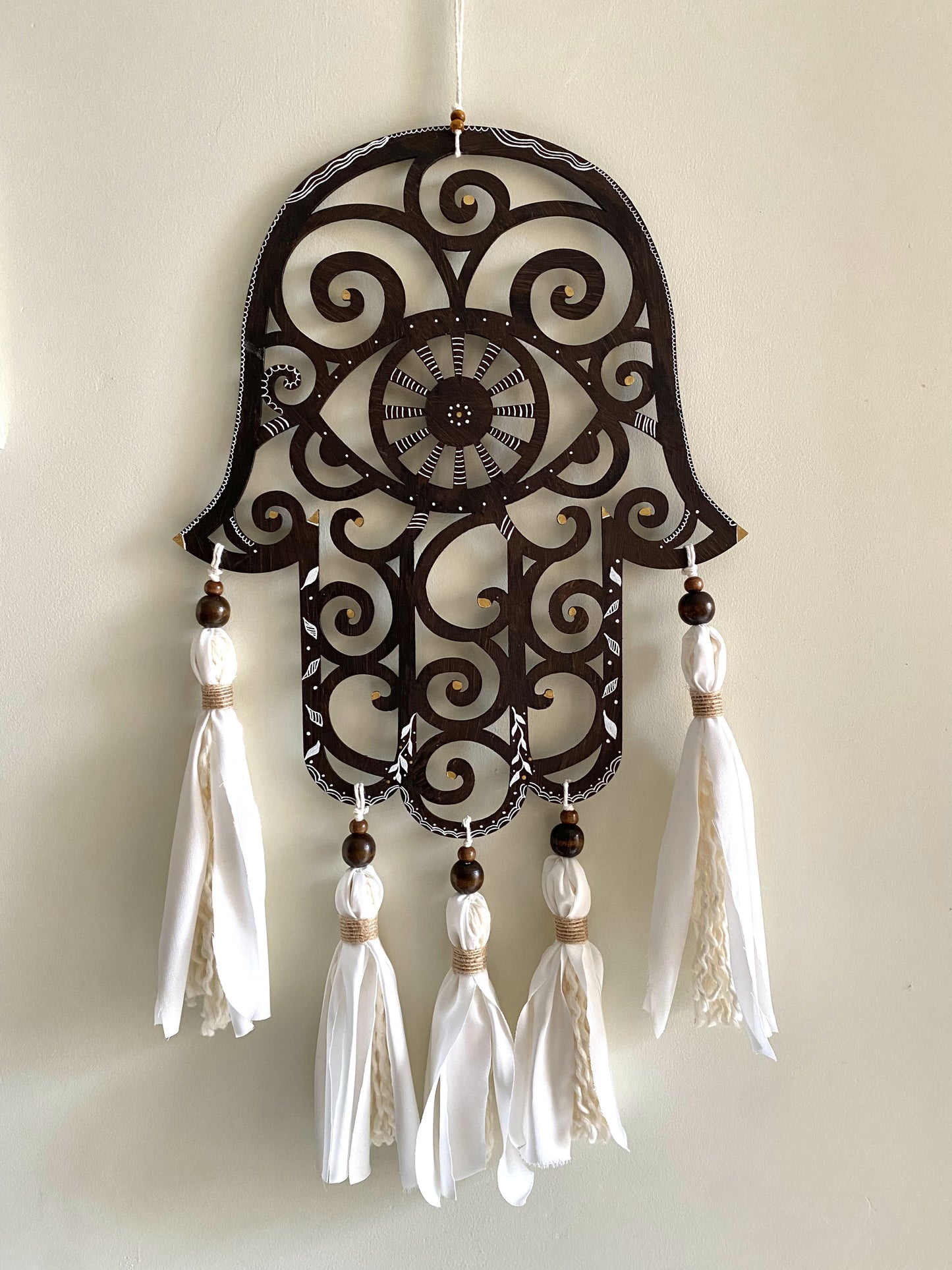 Mano de Fátima con flecos